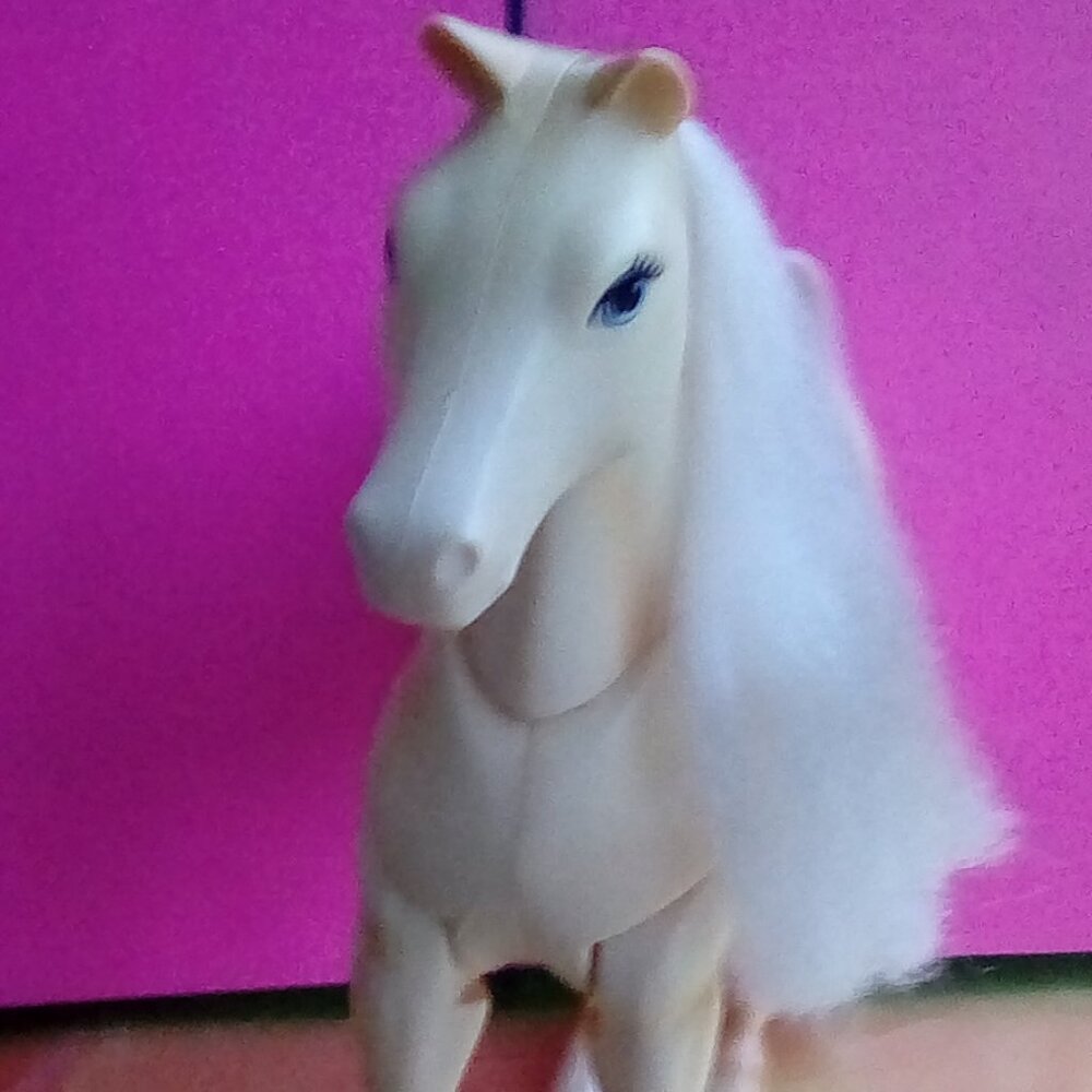 Barbie Doll horse Tawny with a Blue Saddle